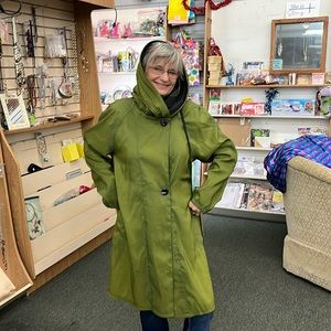 669. Green Jacket, reversible to black with handbag.